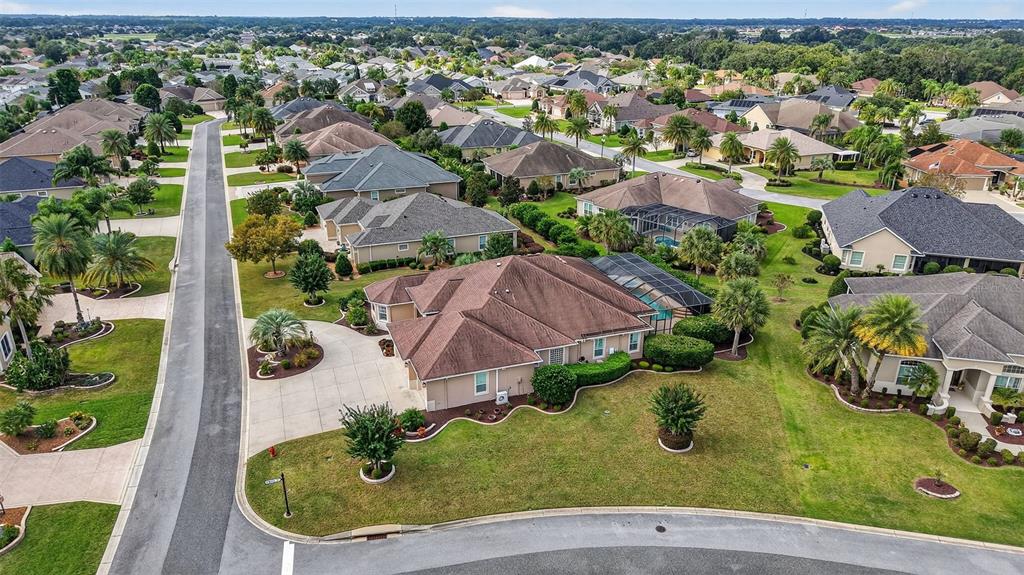 1850 Lake Ridge Drive The Villages, FL 32162 - Photo 63 of 70 an aerial view of residential houses with outdoor space