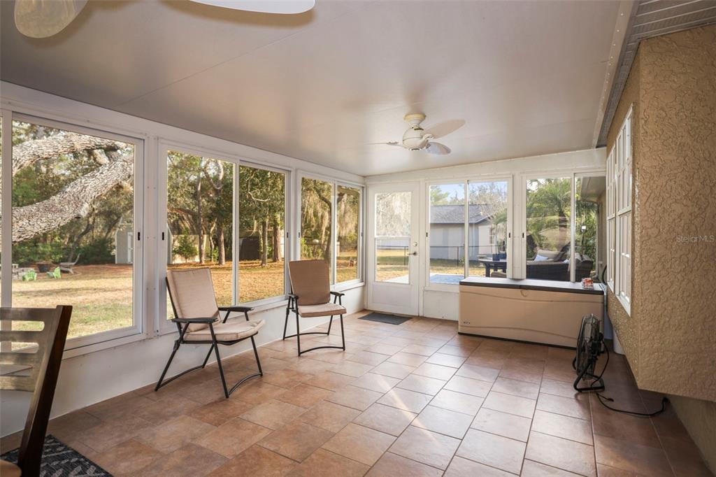 8412 Christopher Lane Weeki Wachee, FL 34613 - Photo 10 of 41 a large white room with a large window