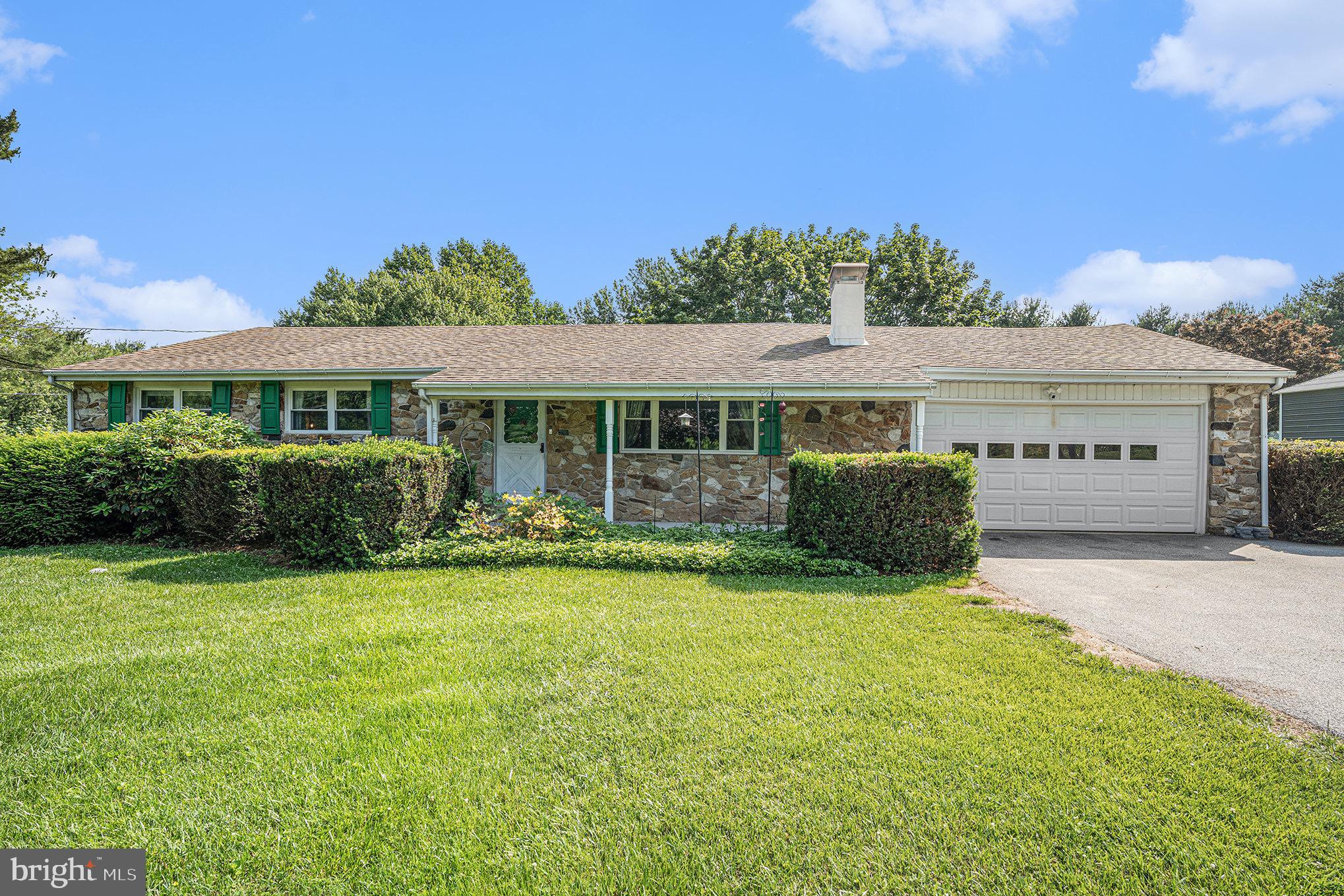 428 Pusey Mill Road Cochranville, PA 19330 - Photo 3 of 26 a view of a house with a yard