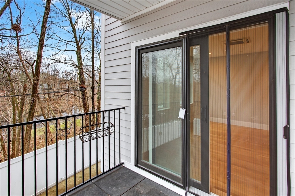 54 River Street, Unit 2 Boston, MA 02126 - Photo 6 of 16 a view of a balcony