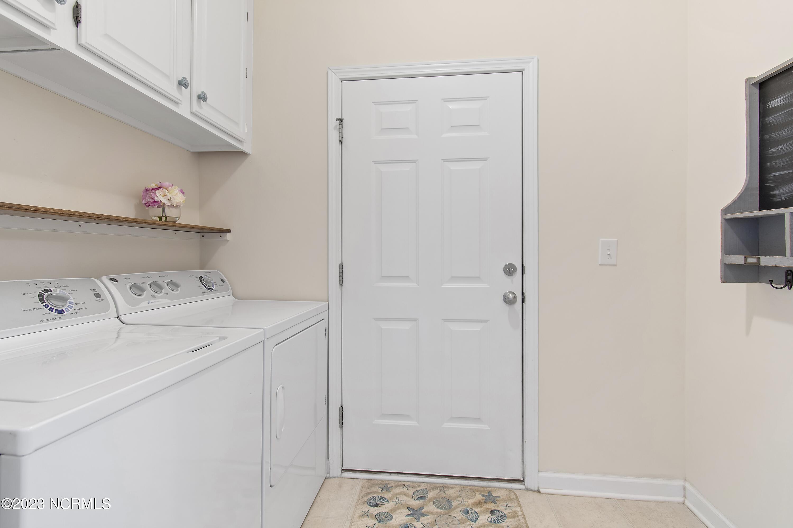 5202 Windlass Road Southport, NC 28461 - Photo 25 of 58 Laundry room with plenty of storage