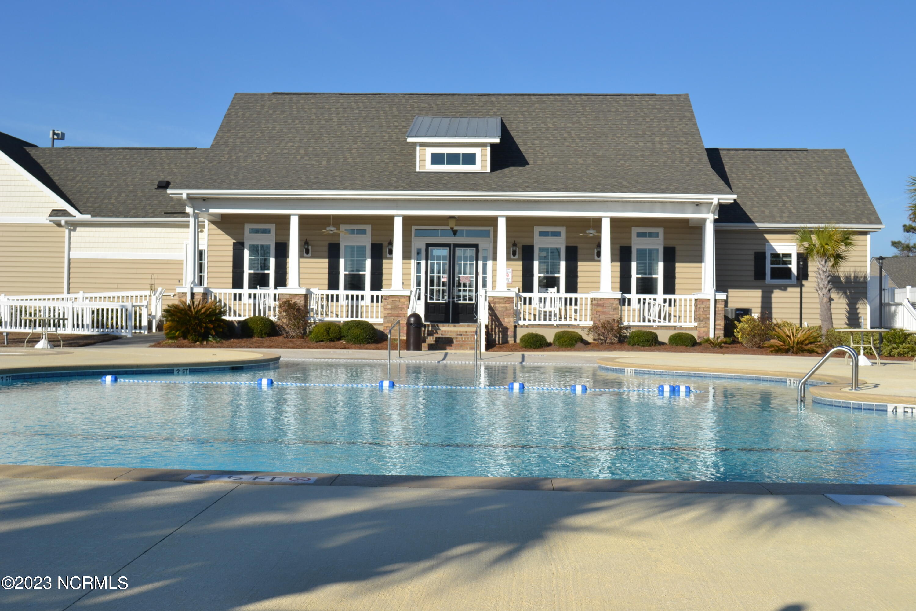 5202 Windlass Road Southport, NC 28461 - Photo 43 of 58 Rivermist outdoor pool and clubhouse