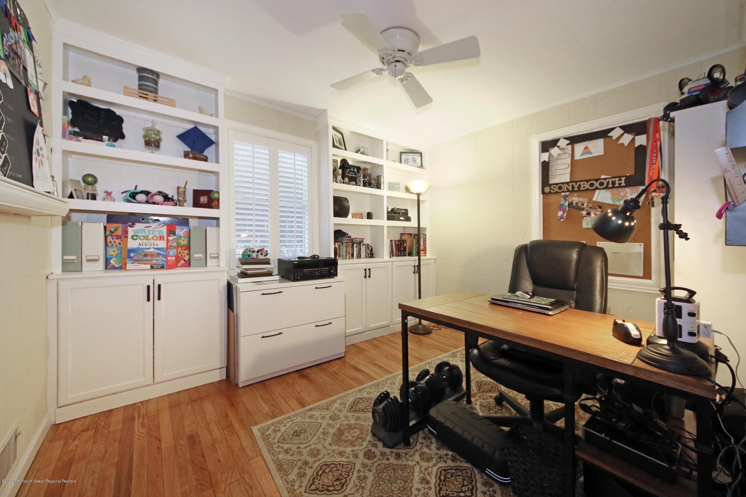 600 E Road Middletown, NJ 07748 - Photo 16 of 23 a room with a workspace and a window