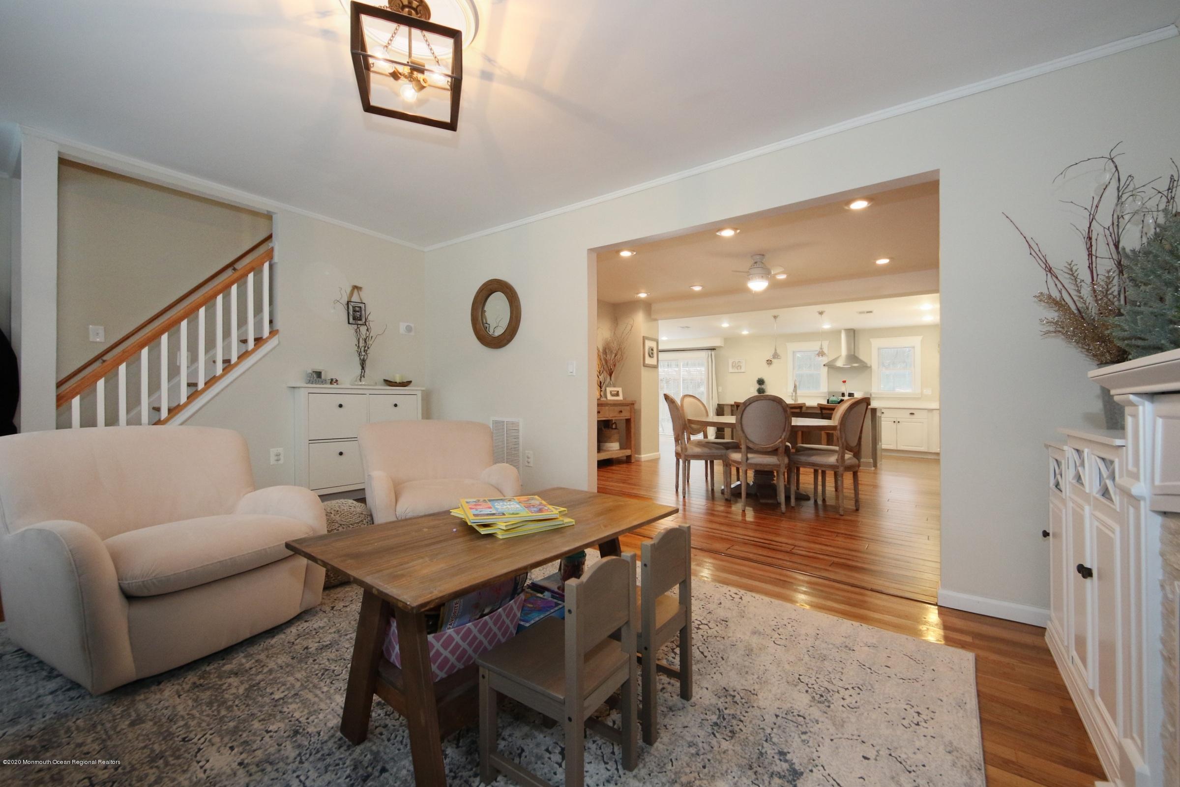 600 E Road Middletown, NJ 07748 - Photo 3 of 23 a living room with furniture and wooden floor
