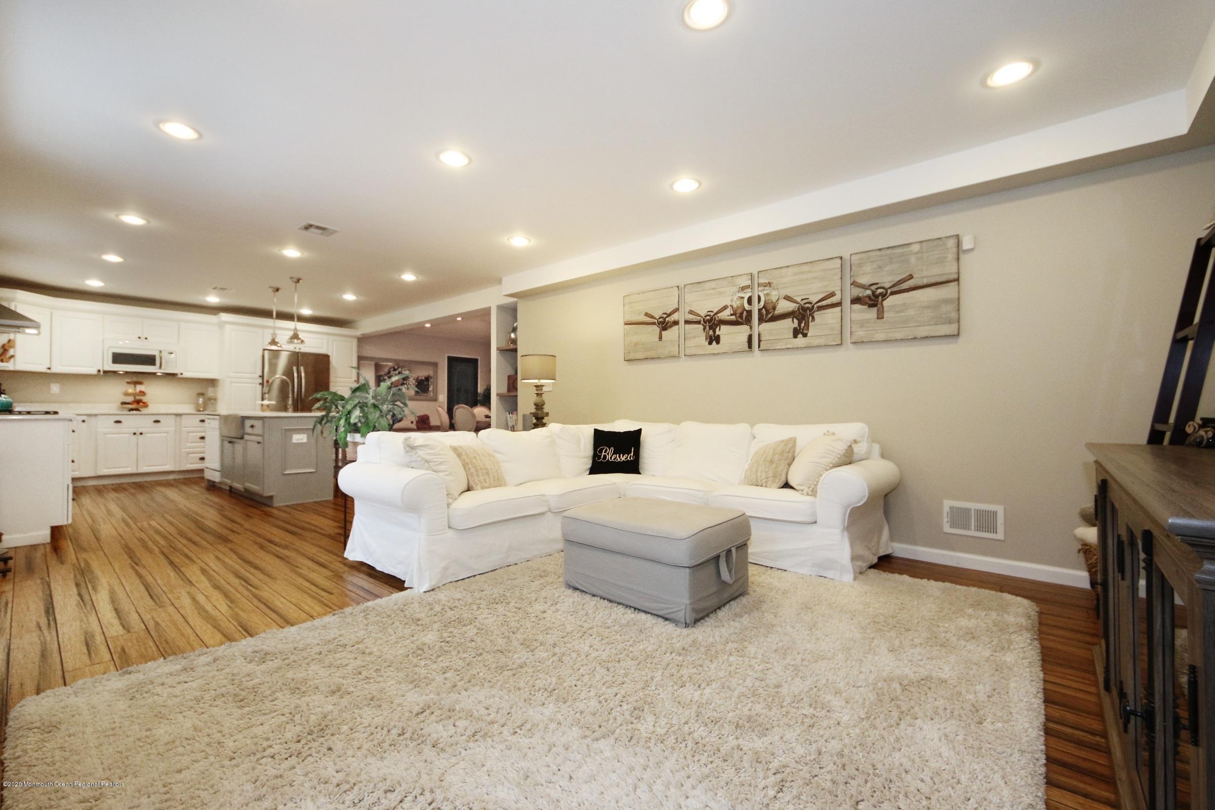 600 E Road Middletown, NJ 07748 - Photo 7 of 23 a living room with furniture and view of kitchen