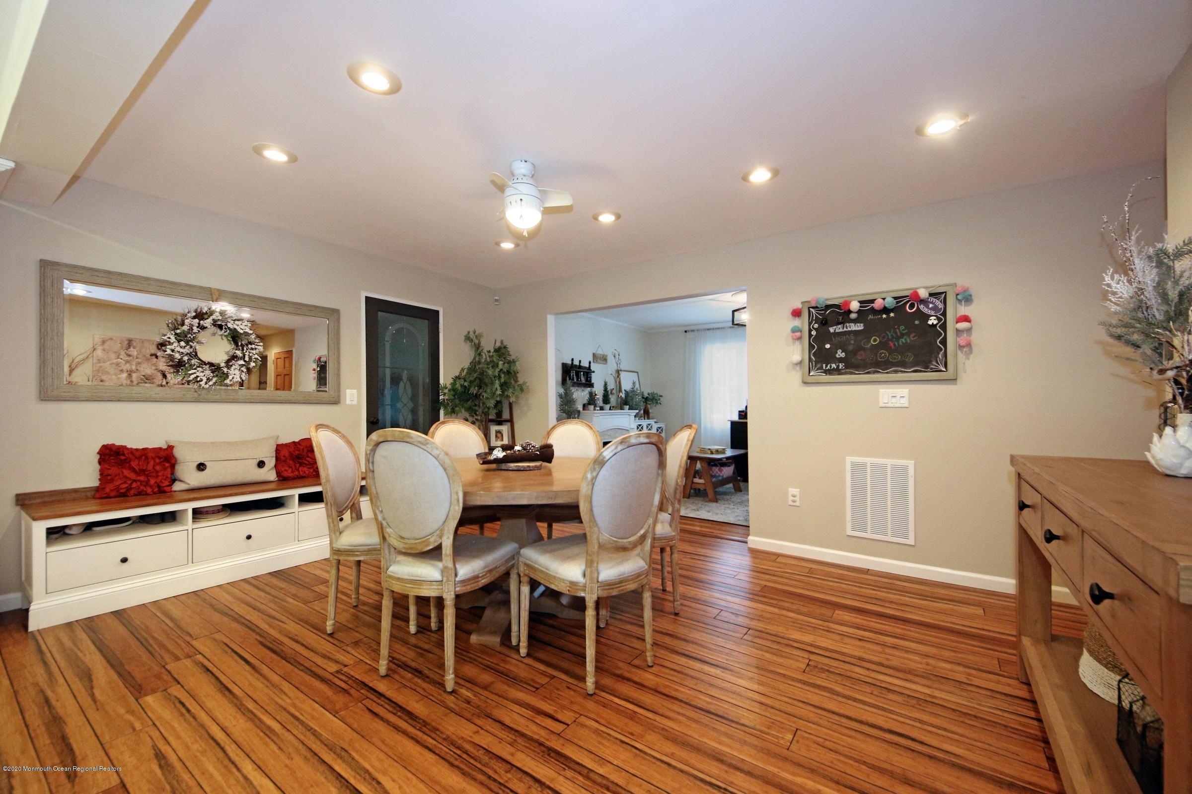 600 E Road Middletown, NJ 07748 - Photo 9 of 23 a dining room with furniture and wooden floor