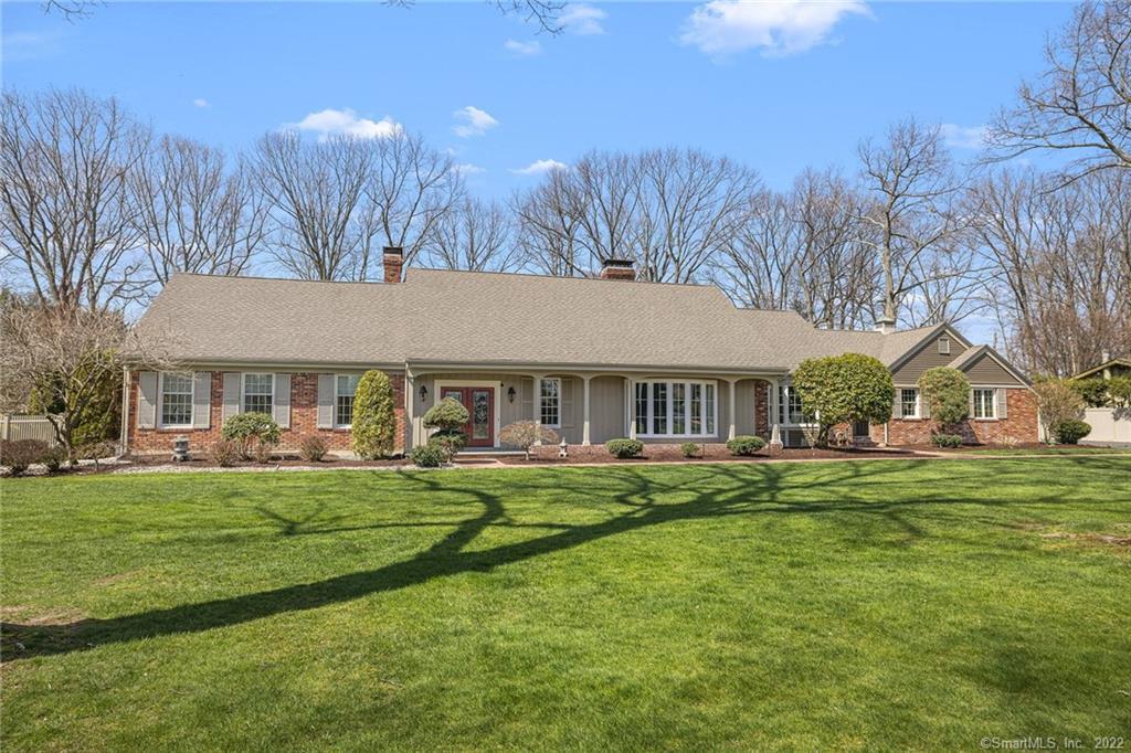 298 High Tower Road Southington, CT 06489 - Photo 1 of 1 a front view of a house with a garden