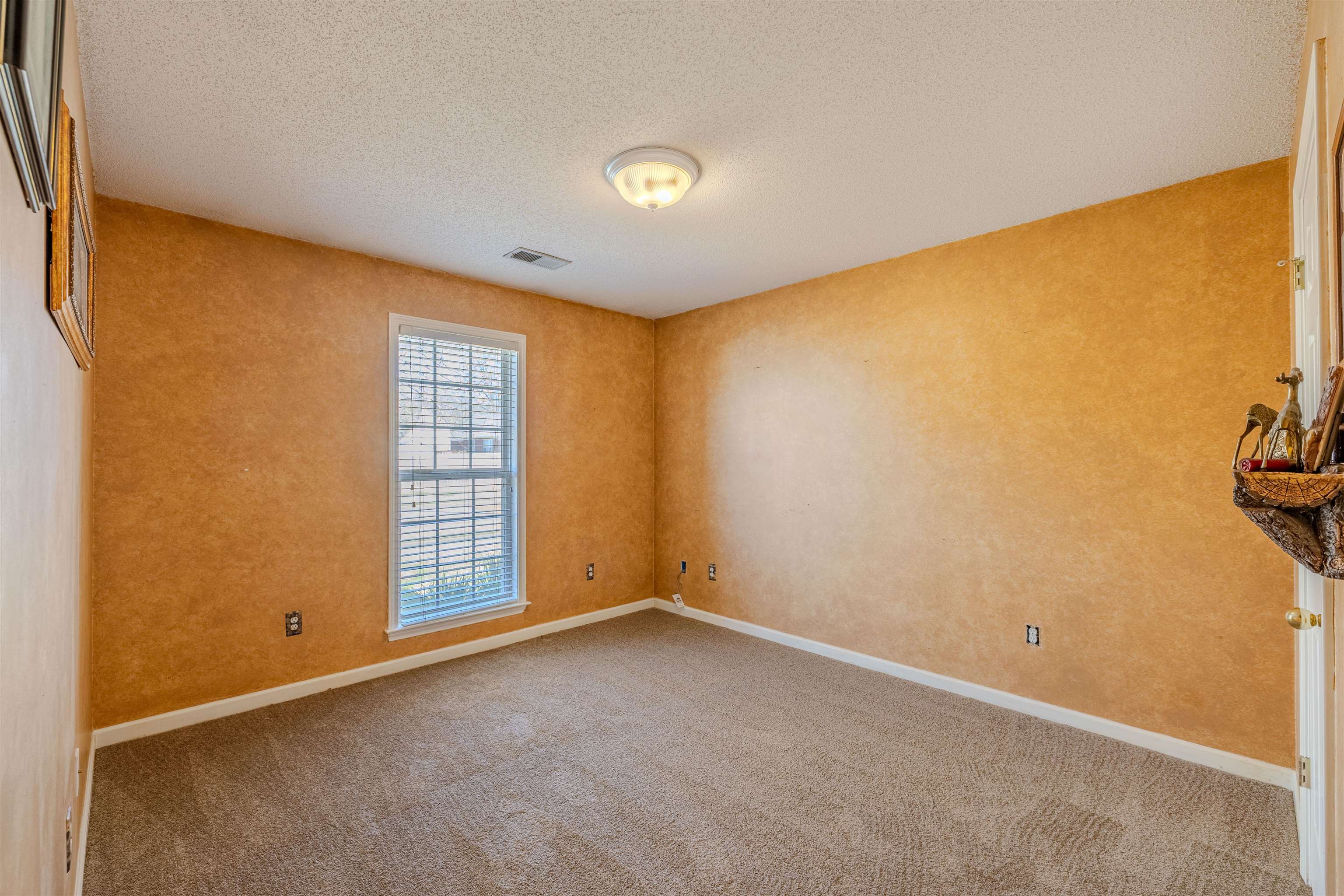 5991 Marley Street Arlington, TN 38002 - Photo 18 of 30 a view of an empty room with a window