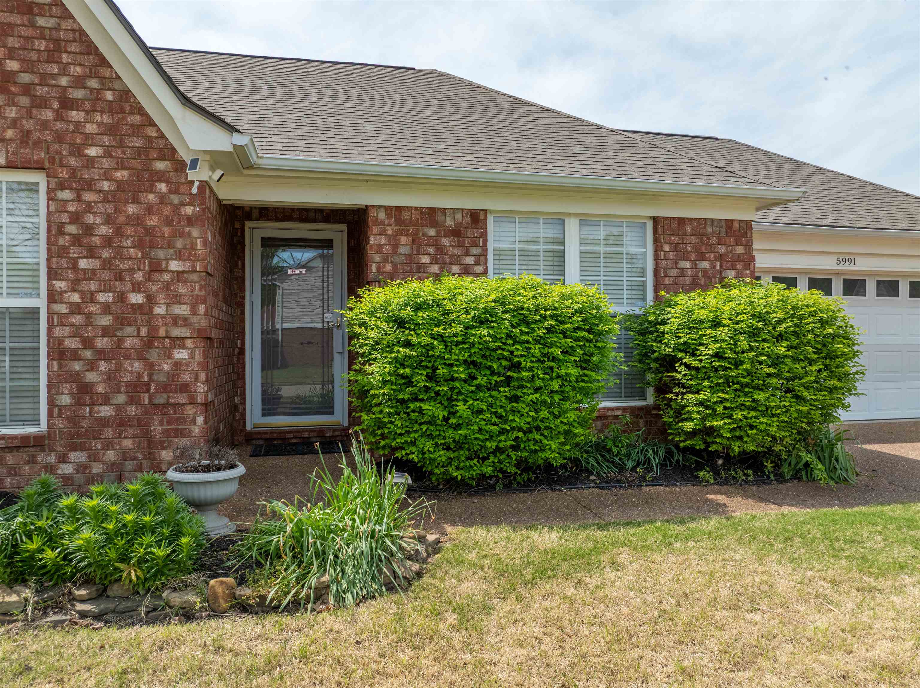 5991 Marley Street Arlington, TN 38002 - Photo 22 of 30 a front view of a house with garden