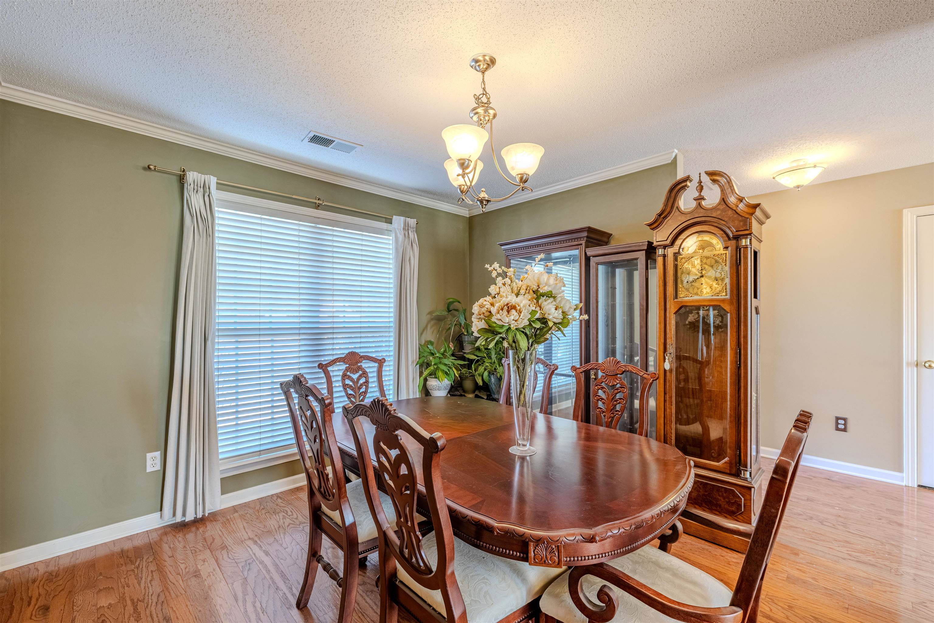 5991 Marley Street Arlington, TN 38002 - Photo 3 of 30 a view of a dining room with furniture window and wooden floor