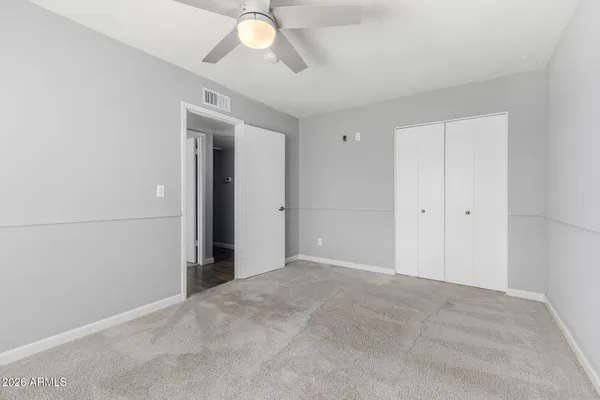 an empty room with a bathroom