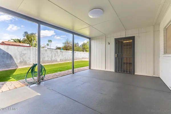 a view of a room with porch and a patio