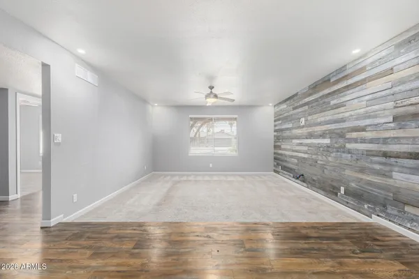 a view of an empty room and window