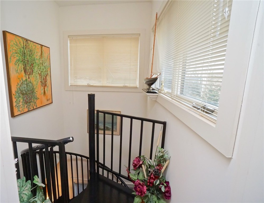 7 Ship Street Jamestown, RI 02835 - Photo 16 of 27 Wide spiral stairs lead the way!