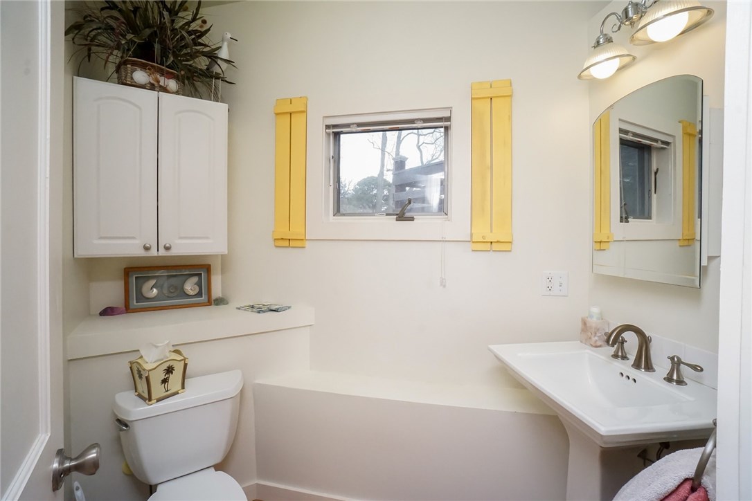 7 Ship Street Jamestown, RI 02835 - Photo 6 of 27 Lavette on first level, there is also a Laundry area, pantry and access to the crawlspace on this level!