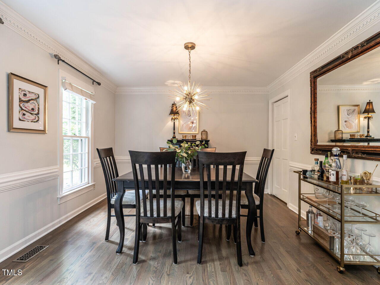 8805 Stage Ford Road Raleigh, NC 27615 - Photo 9 of 45 Just off the Foyer with a convenient door to the Kitchen. Hardwoods, lots of light!