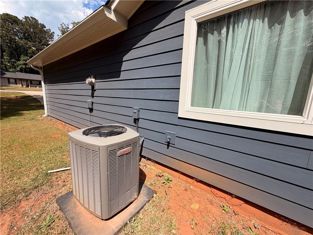 145 Stoneview Circle Covington, GA 30016 - Photo 11 of 41 a view of storage and utility room