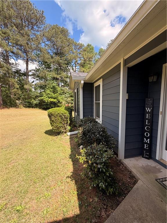 145 Stoneview Circle Covington, GA 30016 - Photo 2 of 41 a view of a backyard of the house
