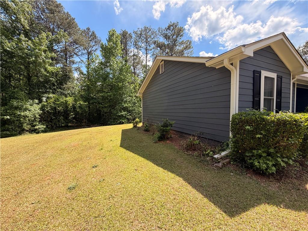 145 Stoneview Circle Covington, GA 30016 - Photo 4 of 41 a view of a backyard