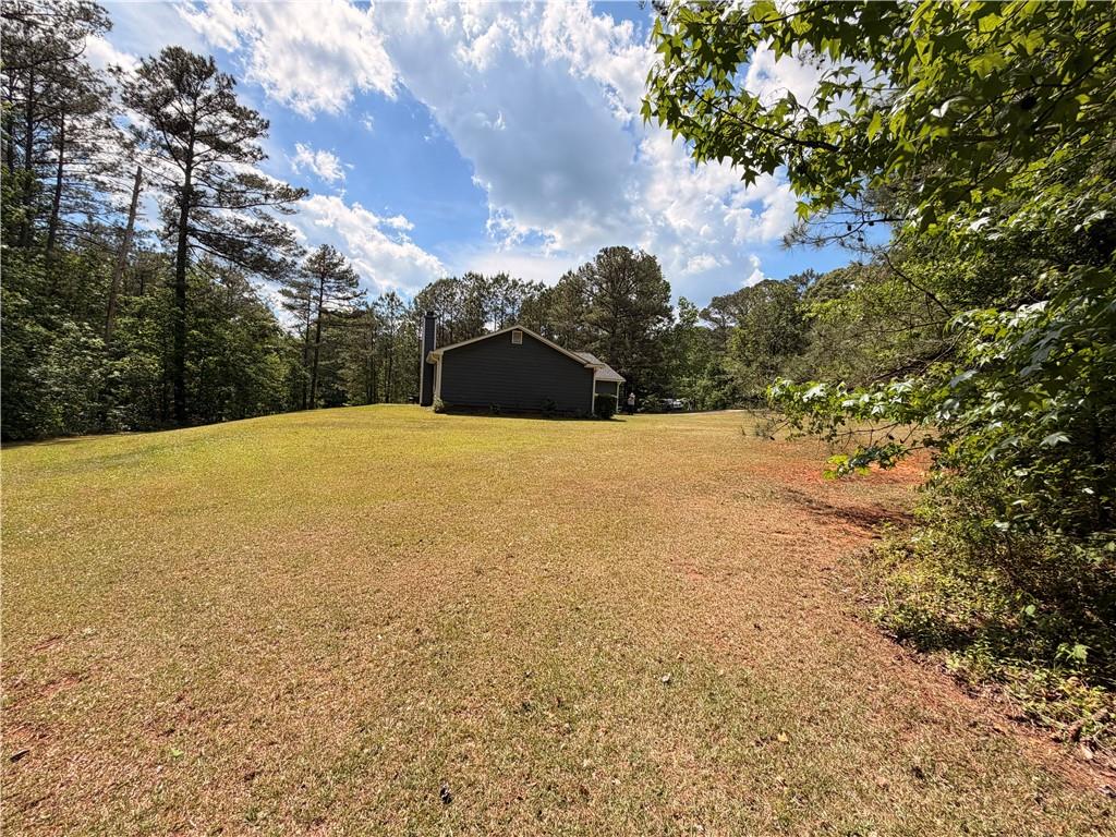 145 Stoneview Circle Covington, GA 30016 - Photo 5 of 41 a view of an outdoor space and yard