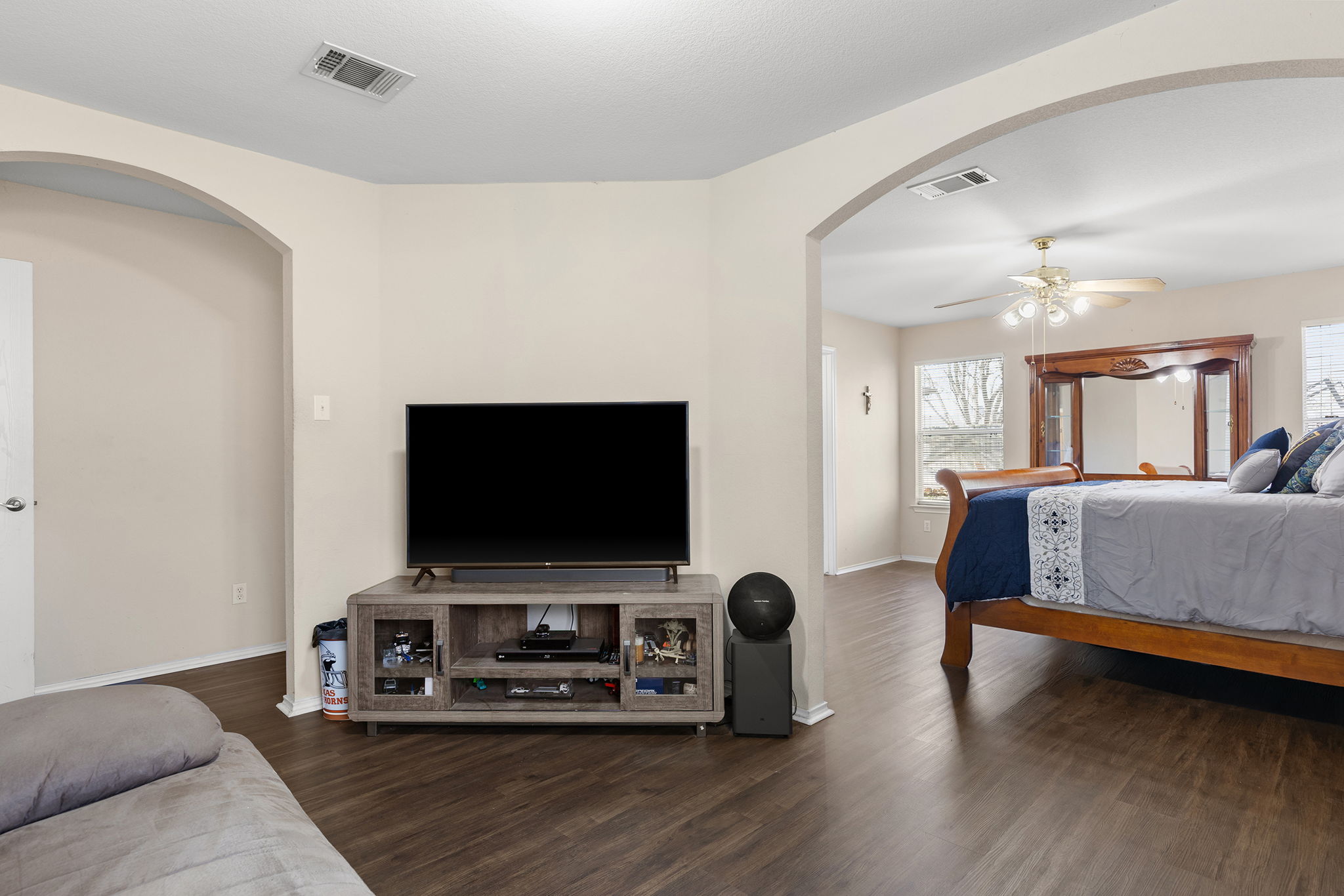12800 Starbrimson Trail Elgin, TX 78621 - Photo 13 of 19 a living room with furniture and a flat screen tv