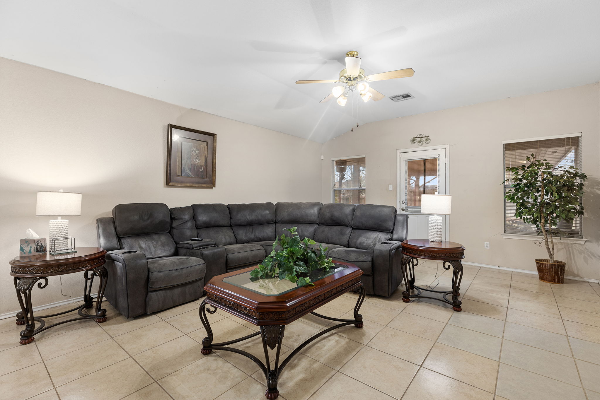 12800 Starbrimson Trail Elgin, TX 78621 - Photo 6 of 19 a living room with furniture and a chandelier
