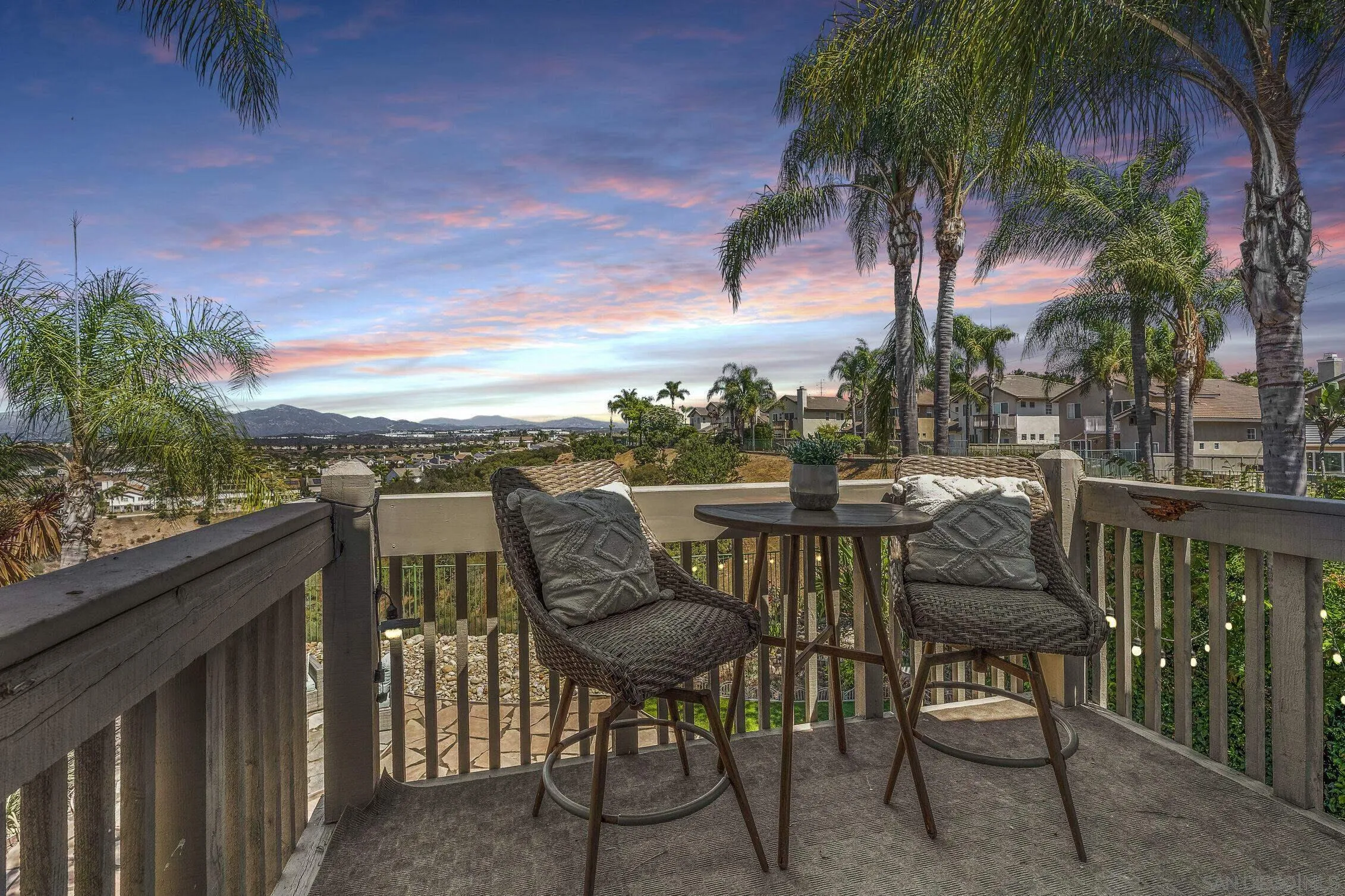 11542 Village Ridge Road San Diego, CA 92131 - Photo 22 of 42 a view of a chairs and table in patio