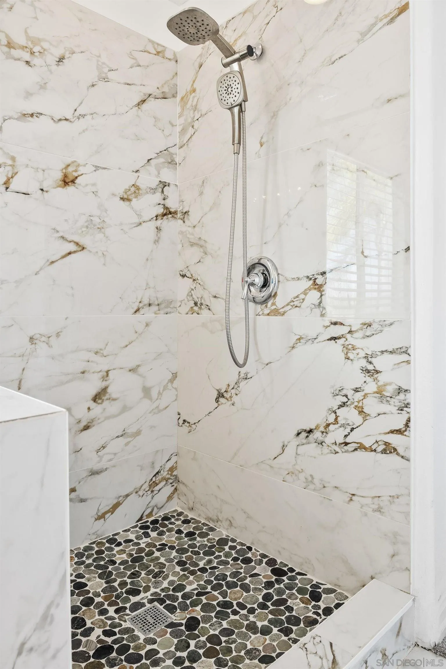 11542 Village Ridge Road San Diego, CA 92131 - Photo 25 of 42 a bathroom with a shower