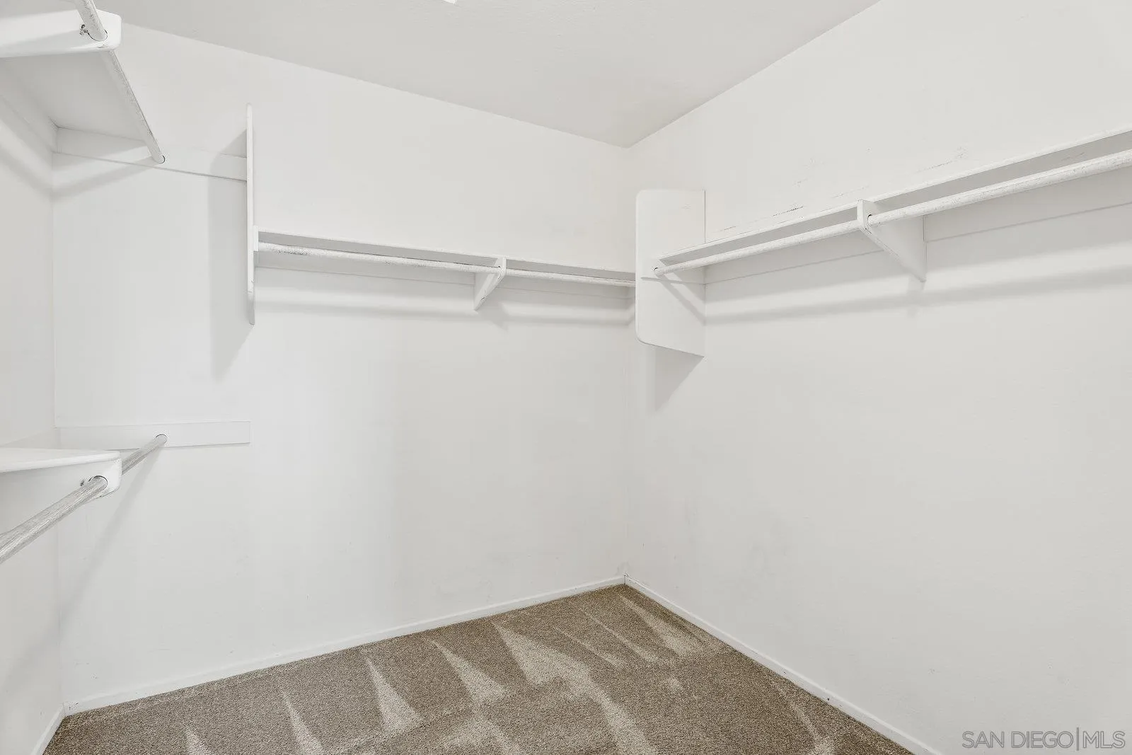 11542 Village Ridge Road San Diego, CA 92131 - Photo 28 of 42 a view of an empty walk in closet
