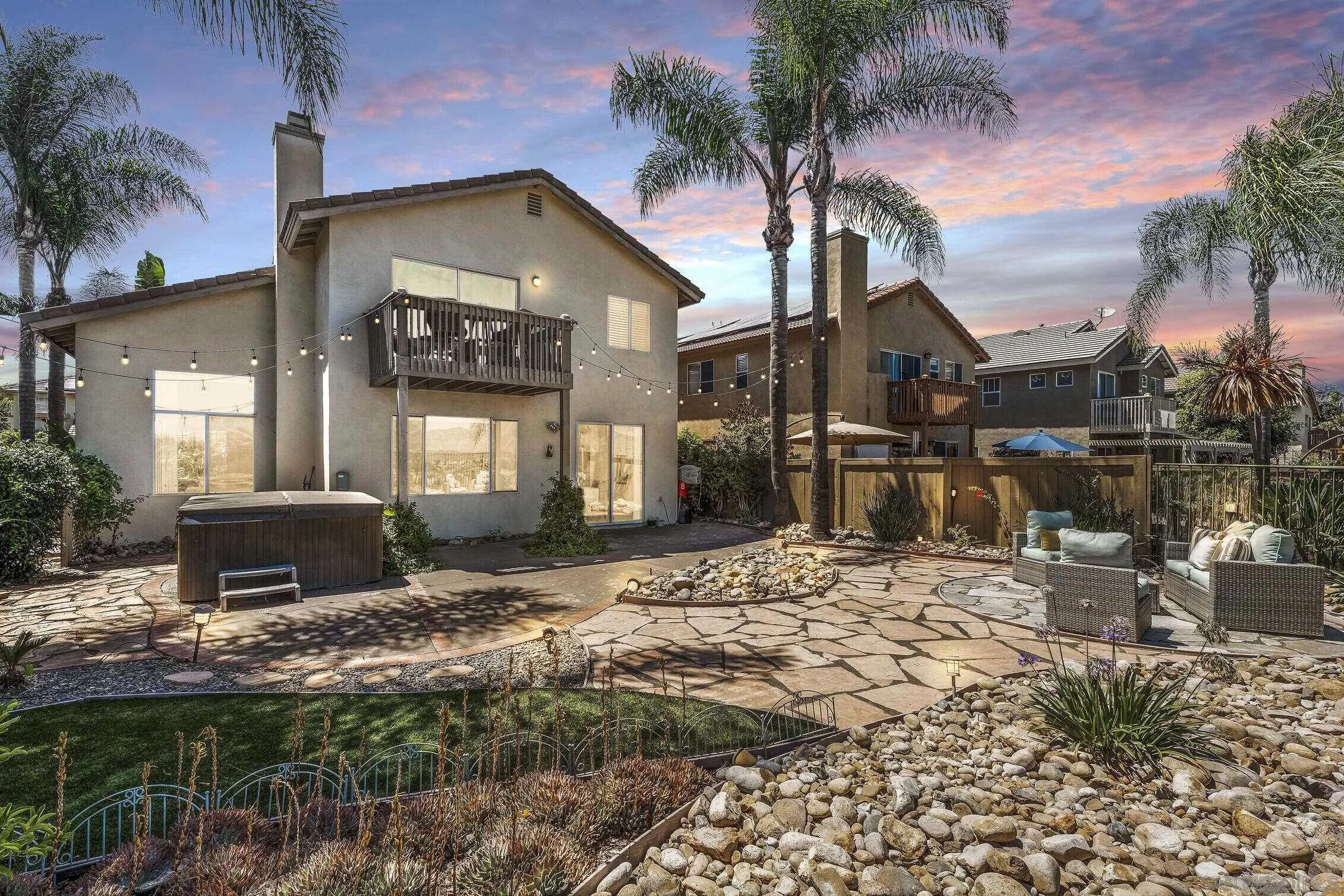 11542 Village Ridge Road San Diego, CA 92131 - Photo 33 of 42 a front view of a house with a yard