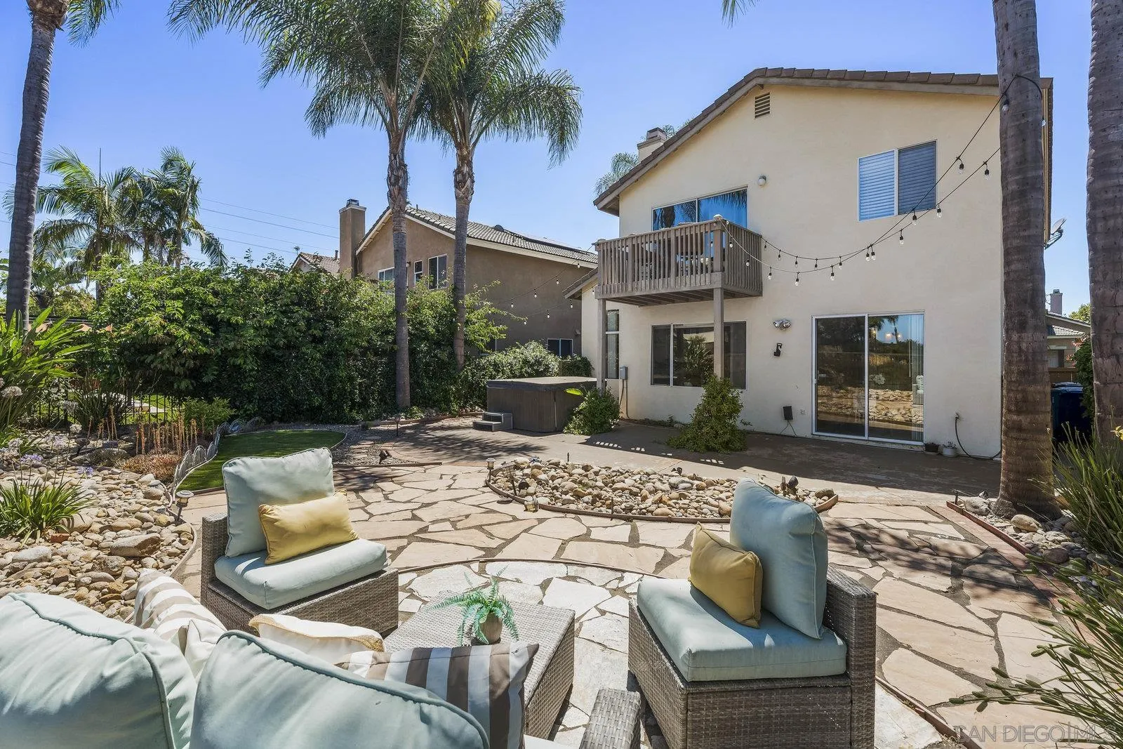 11542 Village Ridge Road San Diego, CA 92131 - Photo 34 of 42 a view of a house with backyard and sitting area