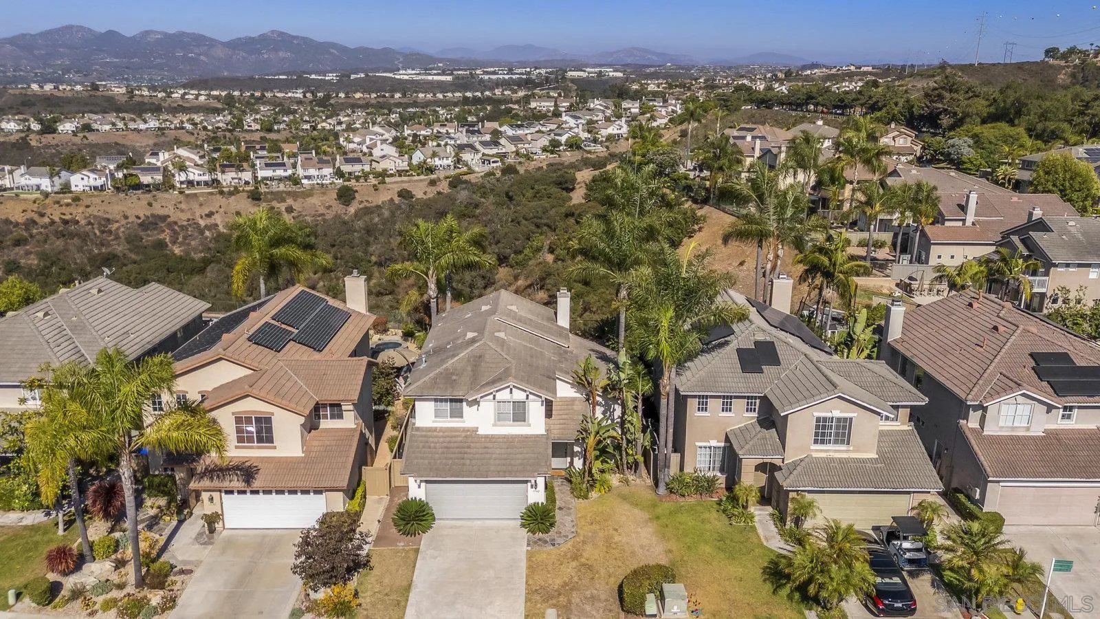 11542 Village Ridge Road San Diego, CA 92131 - Photo 37 of 42 an aerial view of residential houses with outdoor space