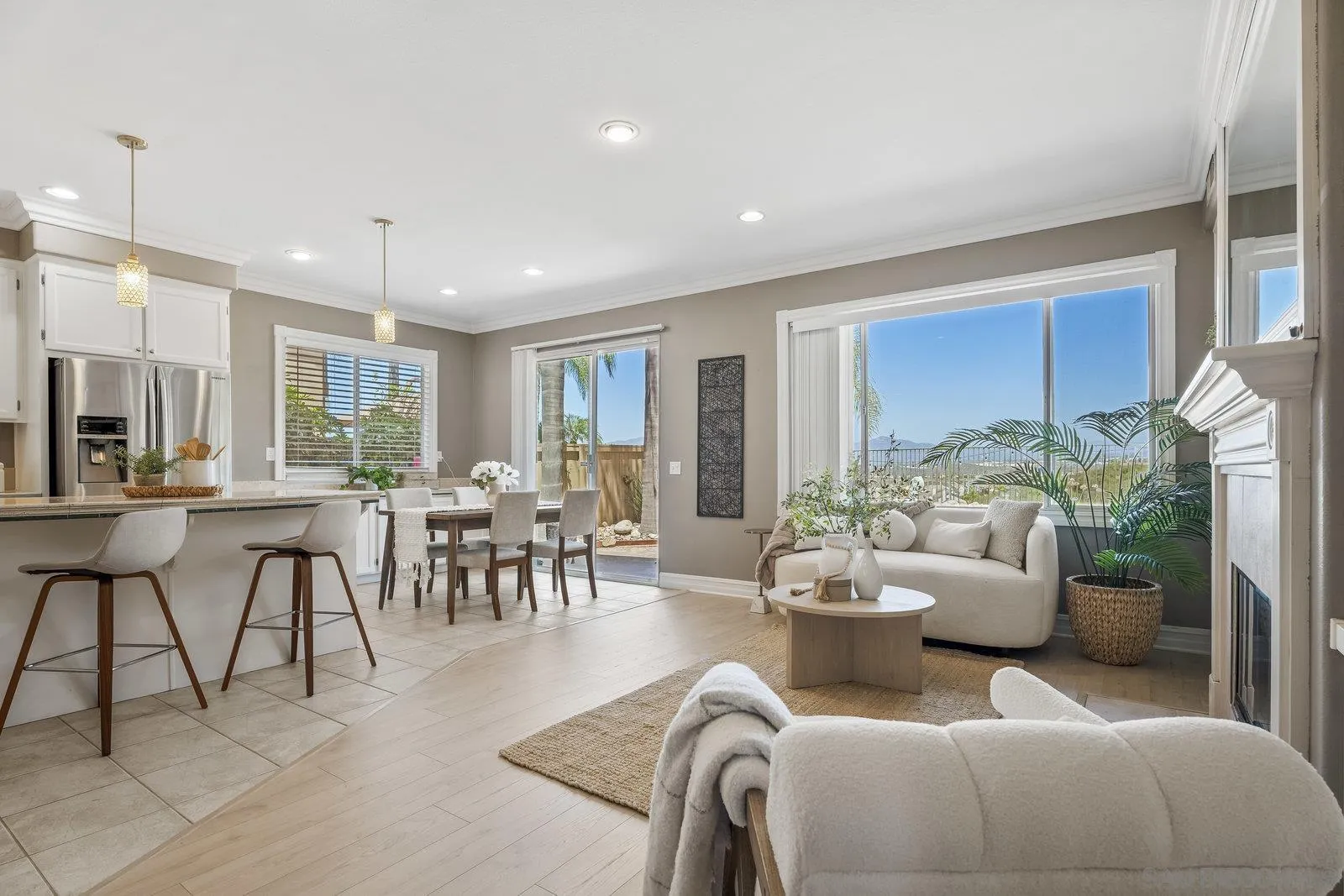 11542 Village Ridge Road San Diego, CA 92131 - Photo 8 of 42 a living room with furniture and a large window