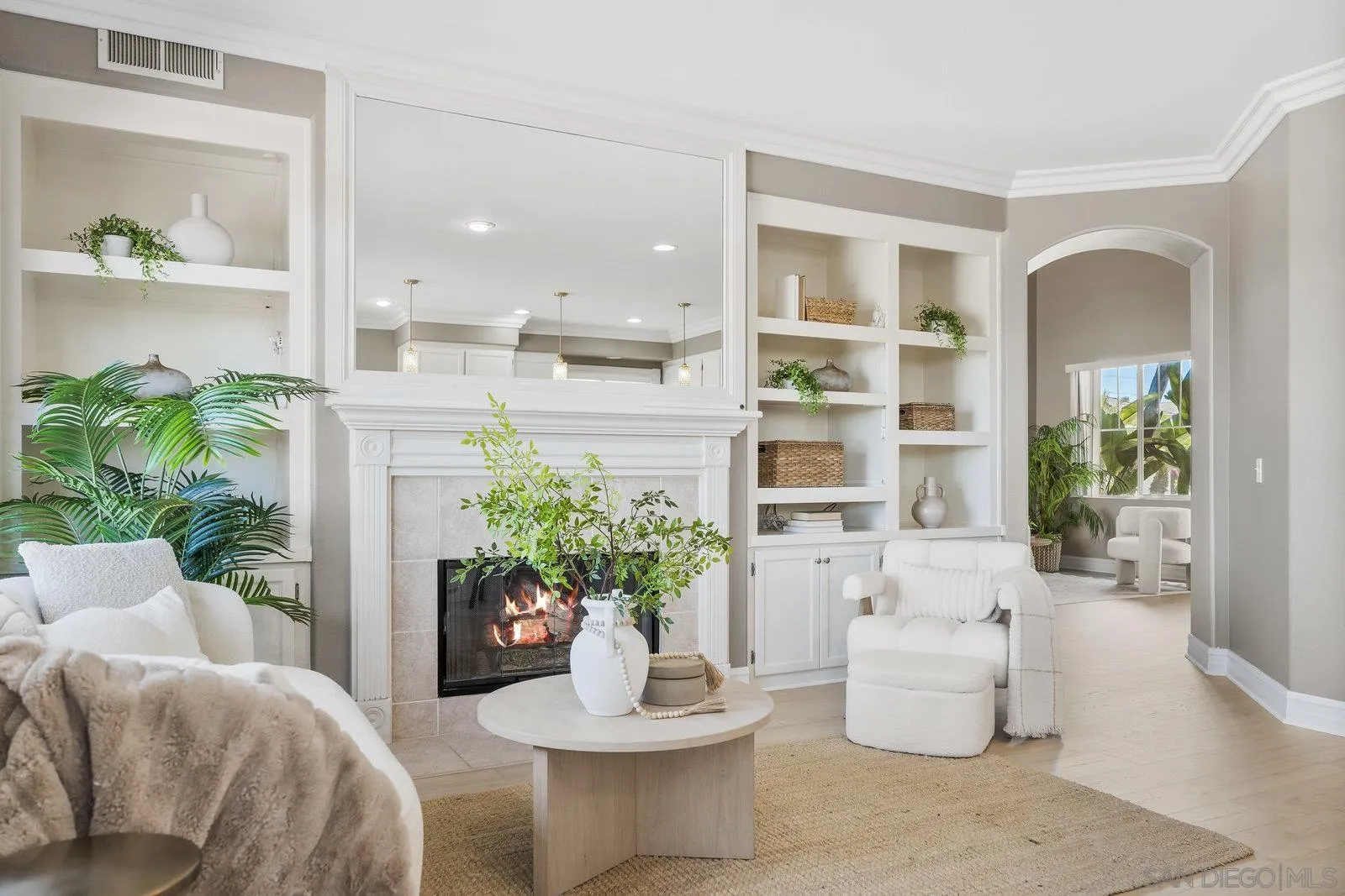 11542 Village Ridge Road San Diego, CA 92131 - Photo 9 of 42 a living room with furniture and a potted plant