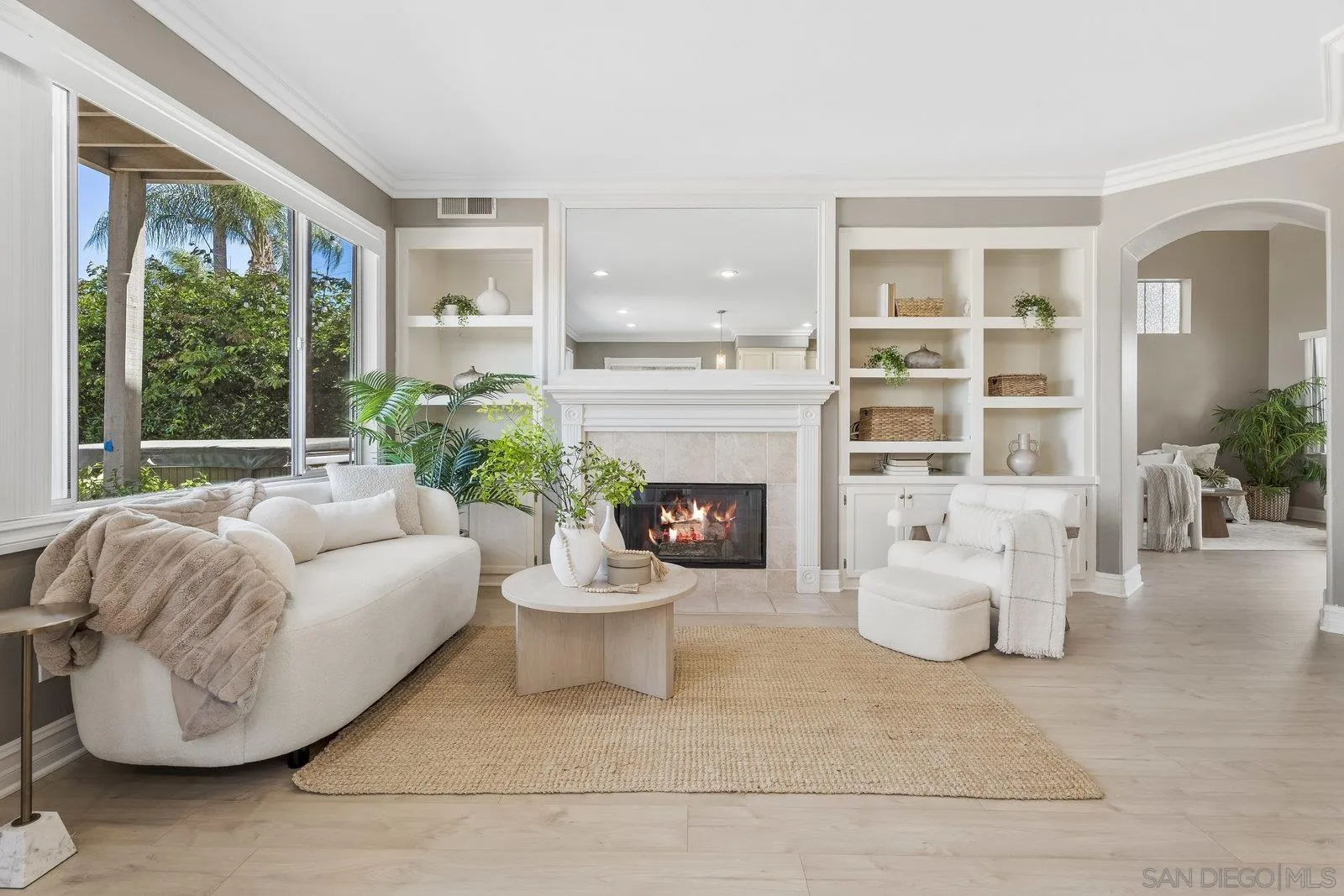 11542 Village Ridge Road San Diego, CA 92131 - Photo 10 of 42 a living room with furniture and a fireplace