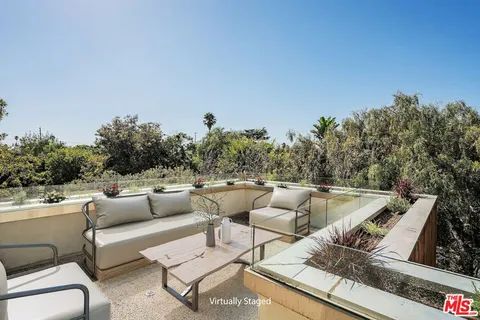 a view of a hallway with a white walls