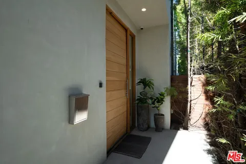 a view of a living room and dining room