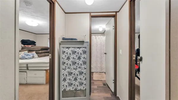 a bathroom with a shower and a sink