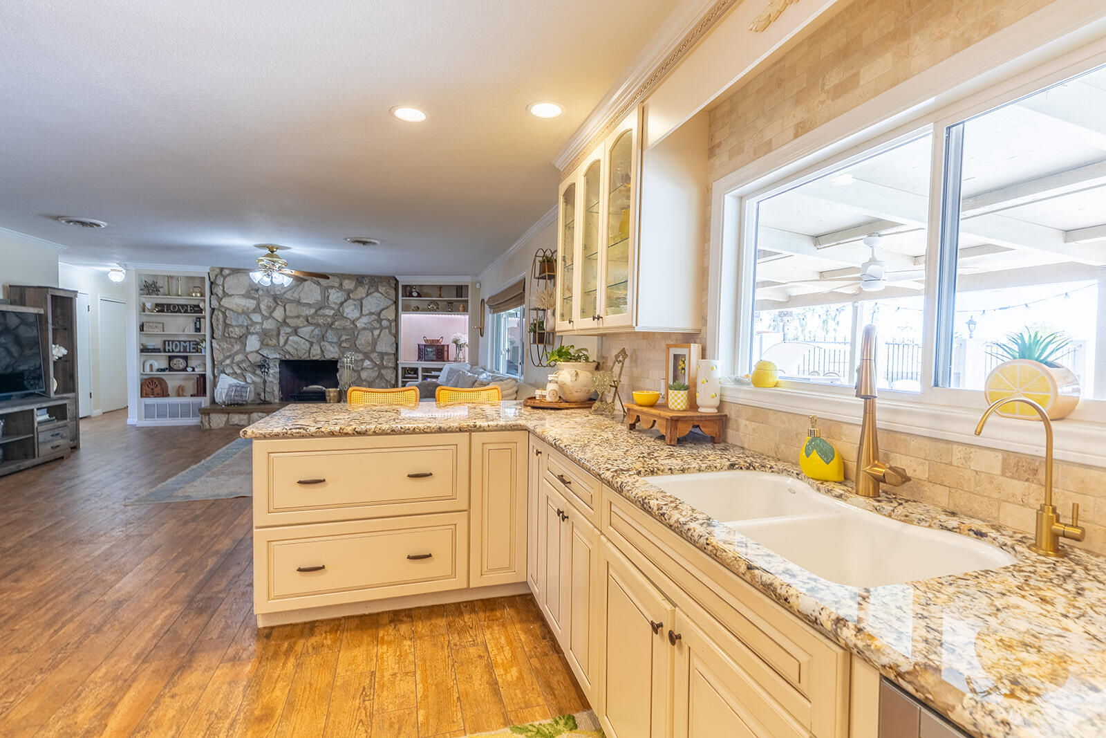 4444 Brandt Road Brawley, CA 92227 - Photo 36 of 93 a large white kitchen with granite countertop a large window and a sink