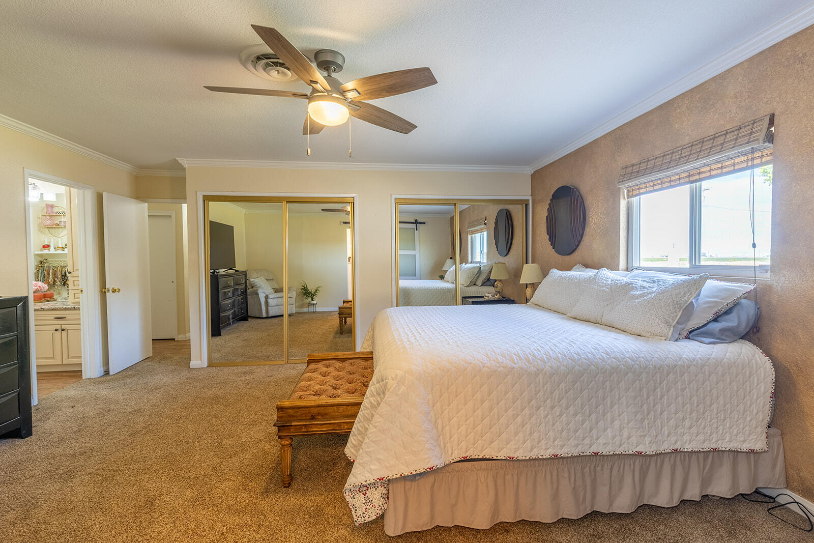 4444 Brandt Road Brawley, CA 92227 - Photo 47 of 93 a spacious bedroom with a bed a dresser and a large window