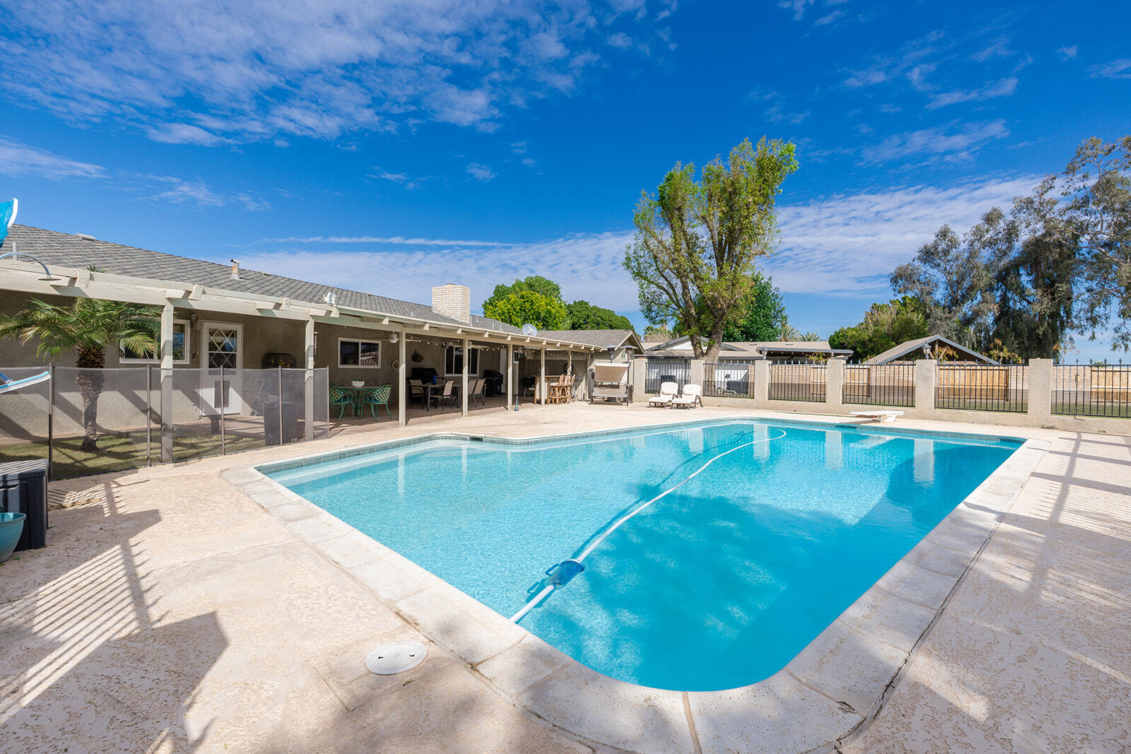 4444 Brandt Road Brawley, CA 92227 - Photo 74 of 93 a view of a swimming pool with a patio