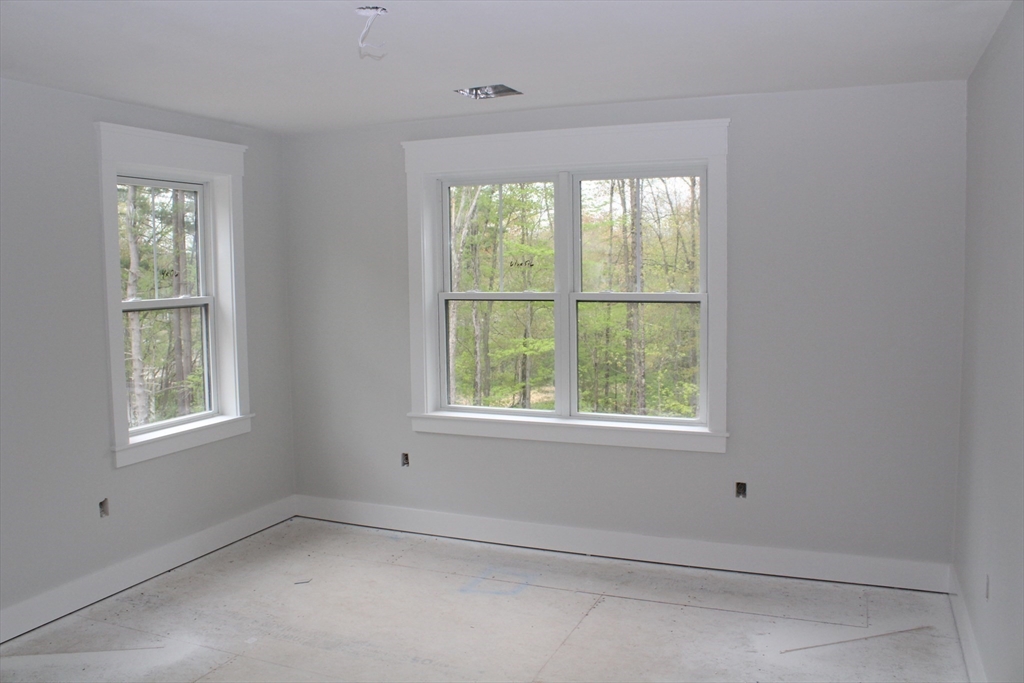 30 Mendon Street Upton, MA 01568 - Photo 23 of 26 an empty room with a window
