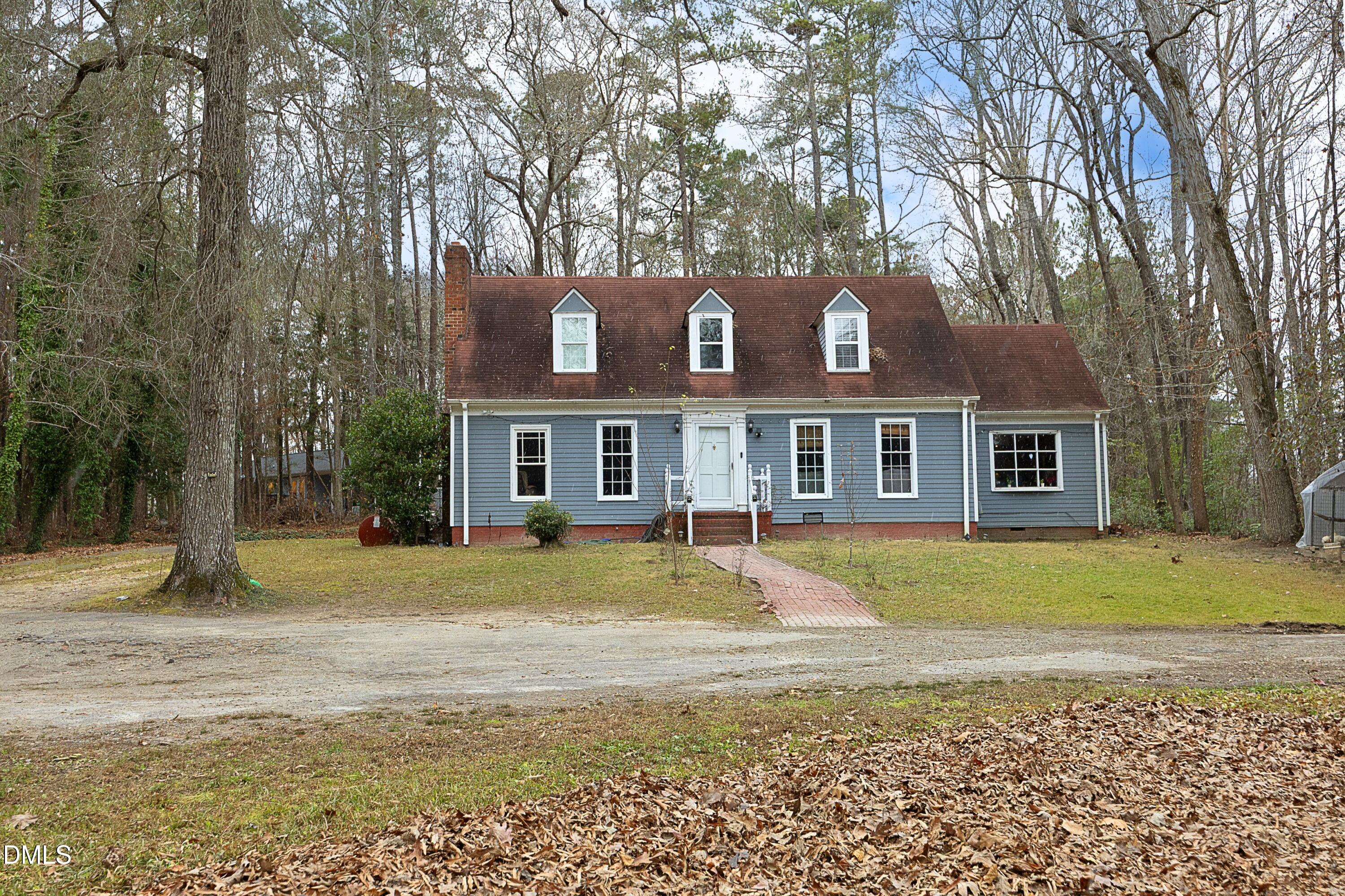 7117 Sunset Lake Road Fuquay-Varina, NC 27526 - Photo 1 of 41 a view of a house with a yard