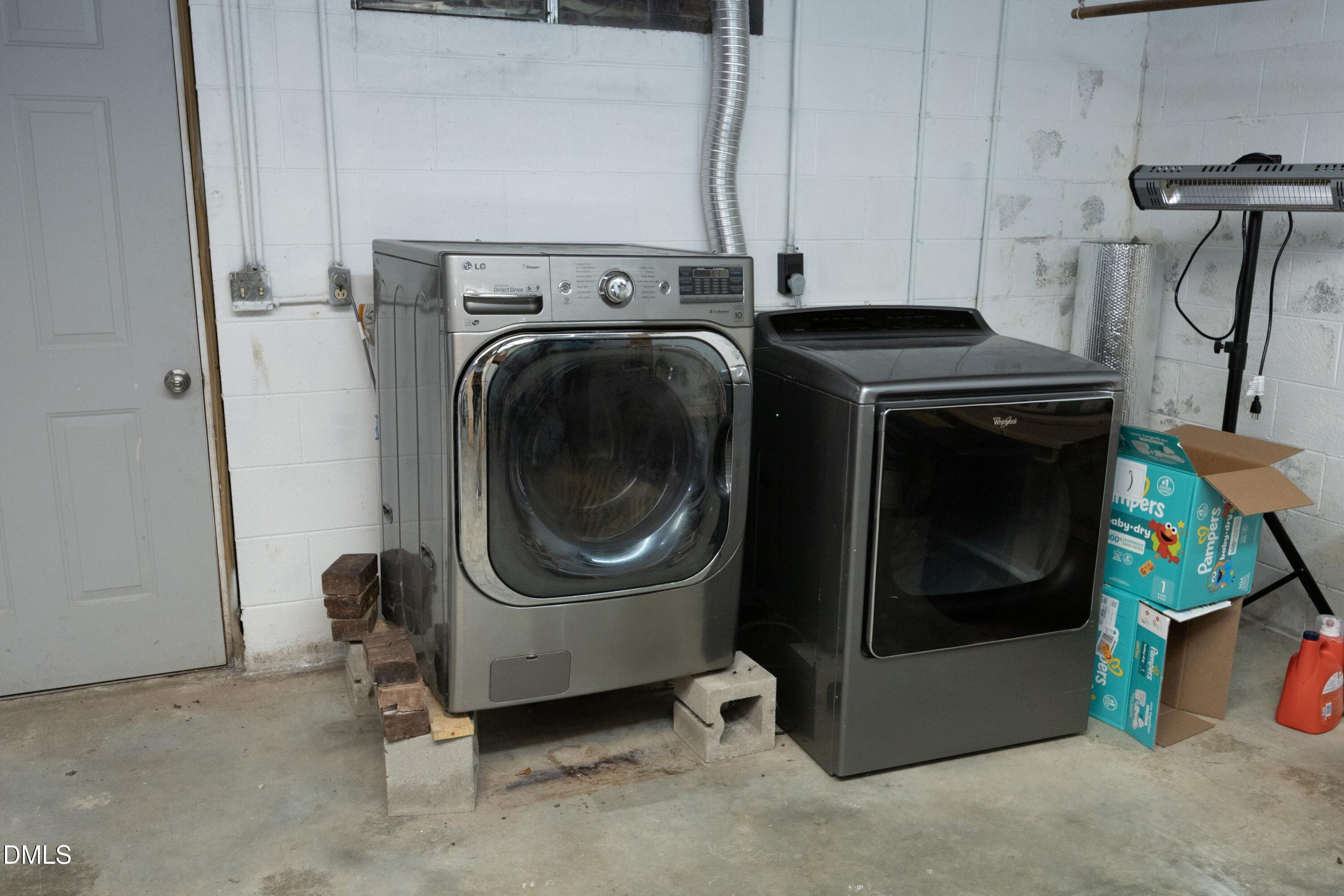7117 Sunset Lake Road Fuquay-Varina, NC 27526 - Photo 30 of 41 a utility room with dryer and washer
