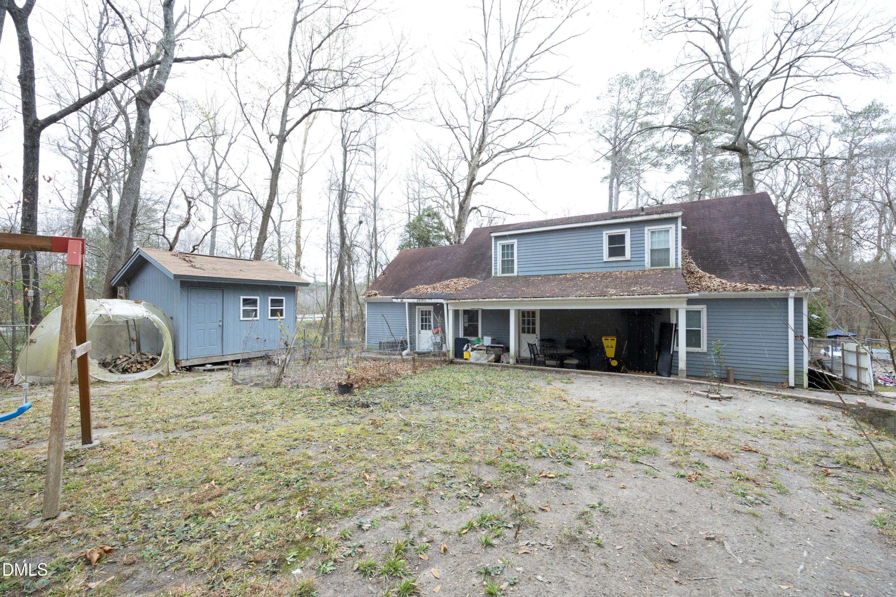 7117 Sunset Lake Road Fuquay-Varina, NC 27526 - Photo 34 of 41 a front view of a house with a yard