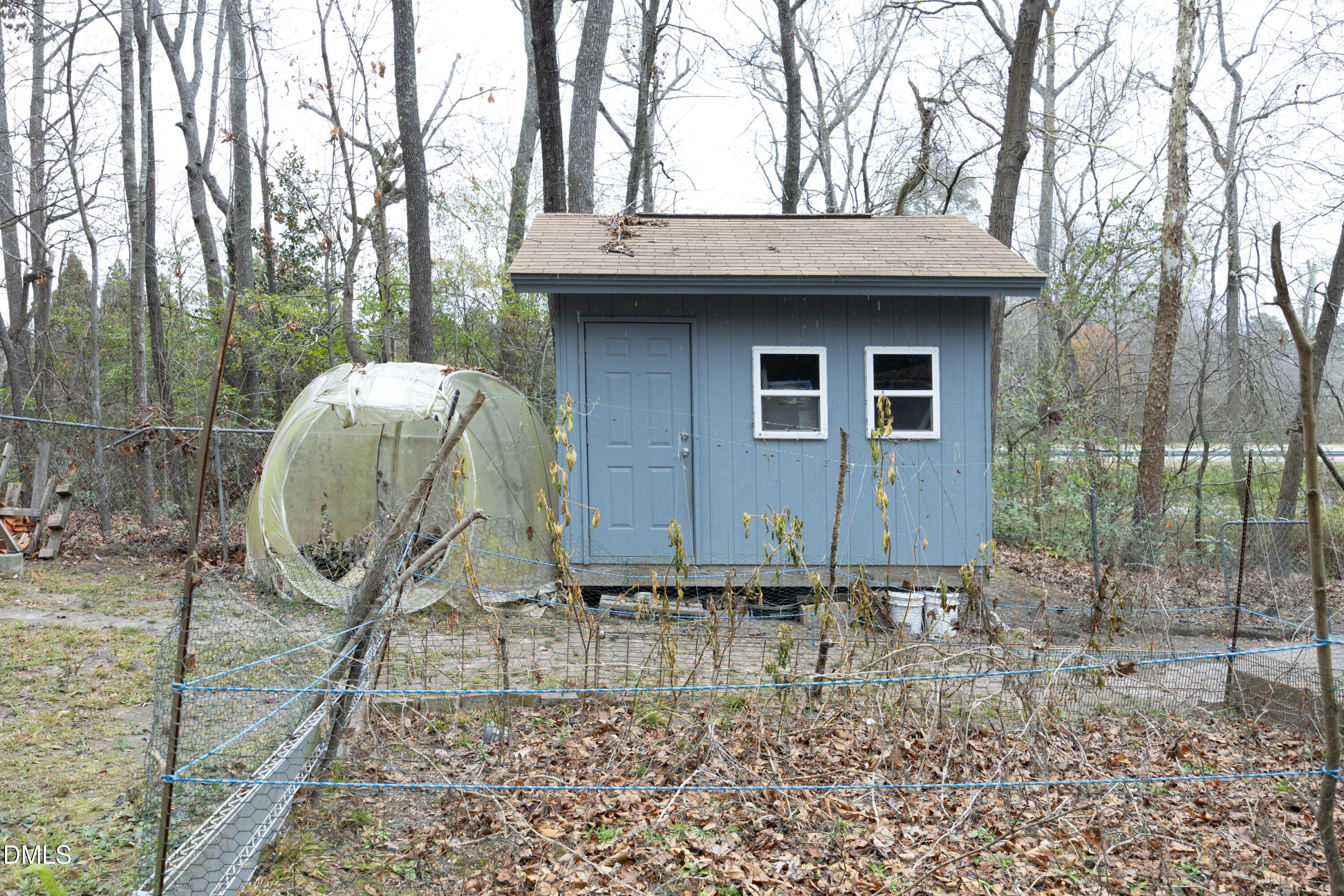 7117 Sunset Lake Road Fuquay-Varina, NC 27526 - Photo 36 of 41 a front view of a house with garden