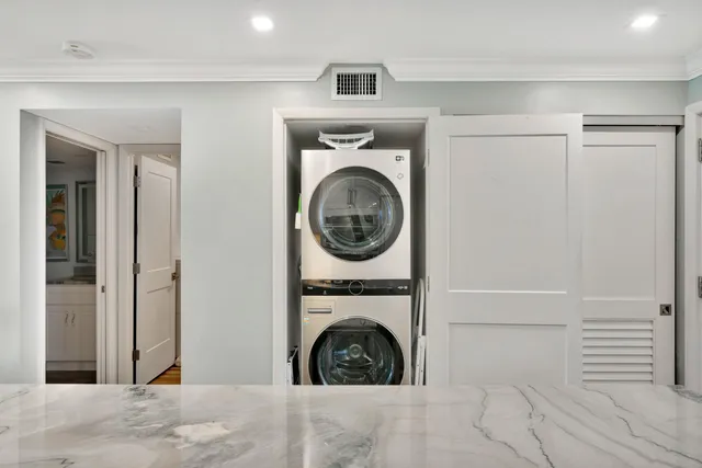 a view of a kitchen with wooden floor