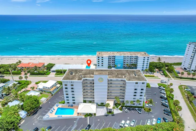 front view of a building with a yard