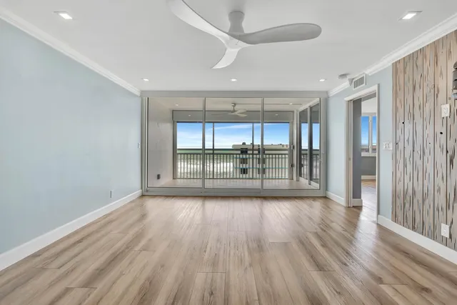 a spacious bathroom with a granite countertop sink mirror and a shower