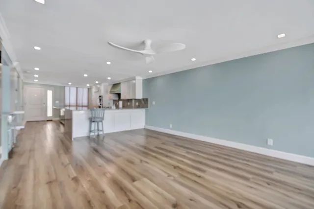 a room with furniture and wooden floor
